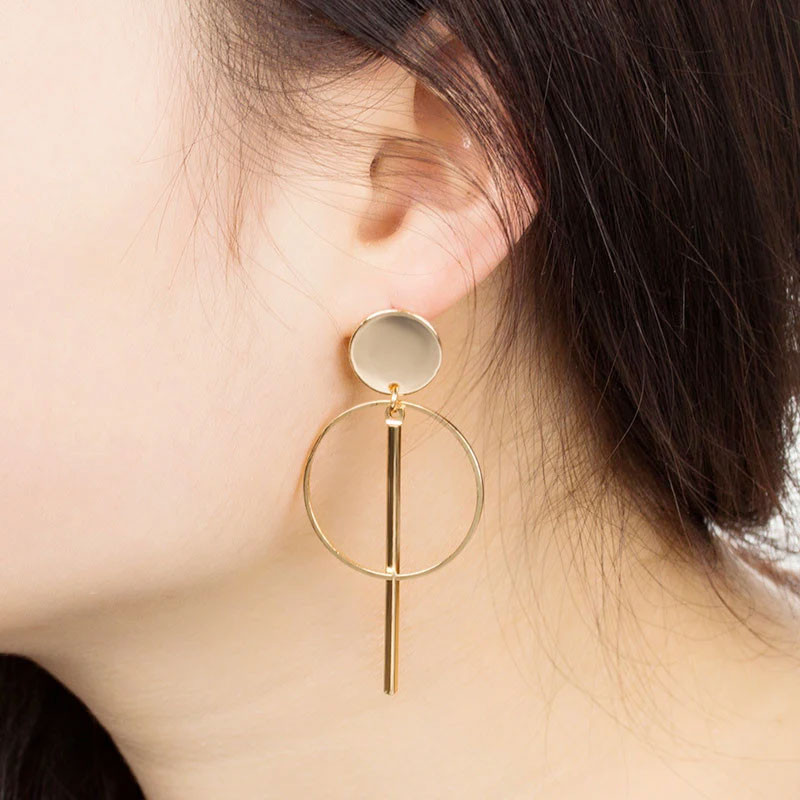 Earrings with geometric gold clips - Clip earrings