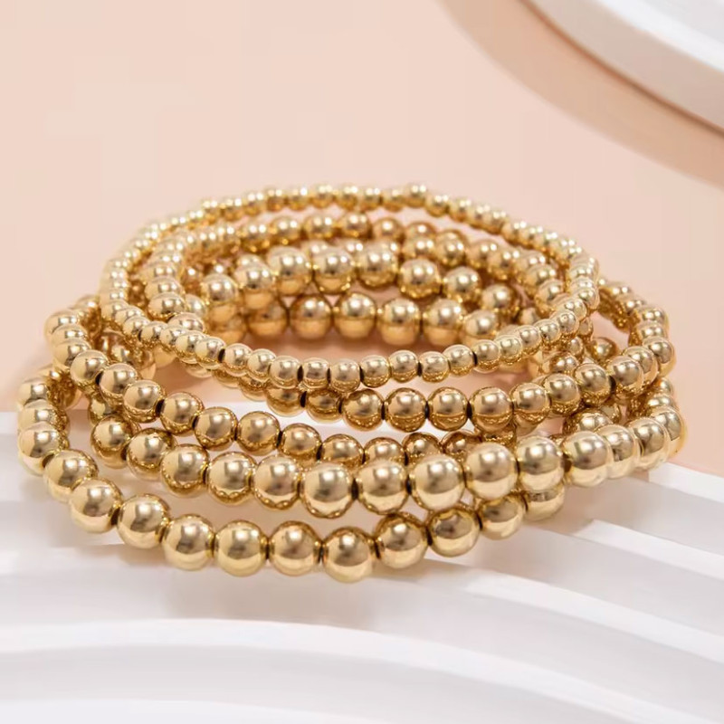Gold Beaded Multi-Bracelet - Stretch bracelets