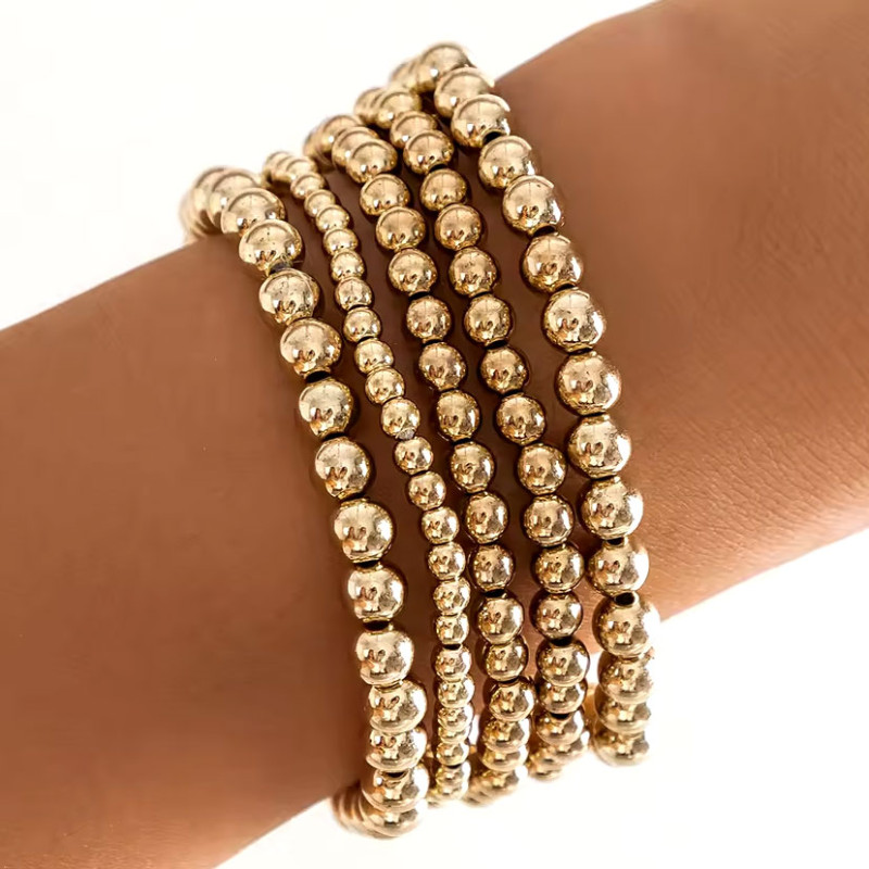 Bracelet multiple perles dorées - Bracelets pour travestis
