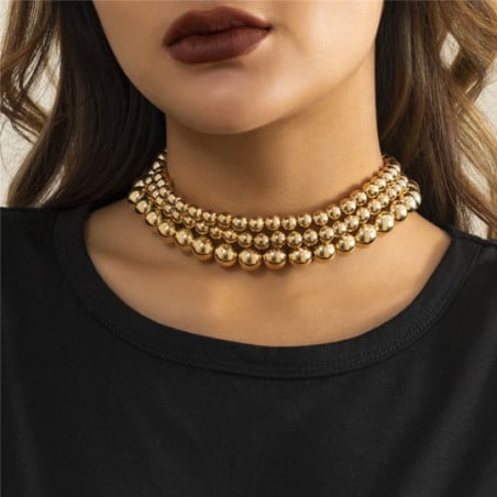 Round necks in gold beads - Necklaces